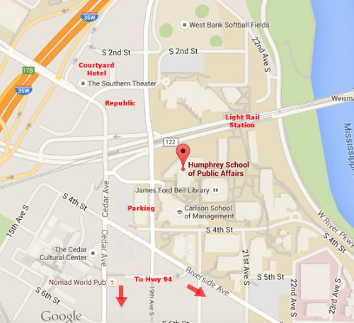 Google street map with conference venue, hotel, parking, and light rail station labeled.